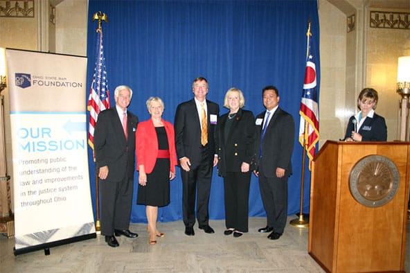 Photo of Gerald S. Leeseberg with Justices O’Donnell and Lanzinger, and Chief Justice Maureen O’Conner at induction as Fellow of the Ohio State Bar Foundation.
